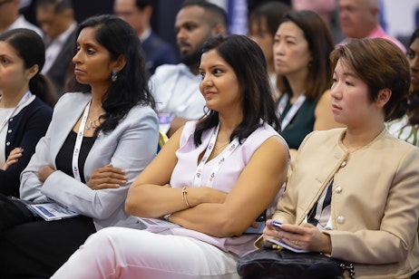 The AI Summit Series - An audience member enjoys the conference
